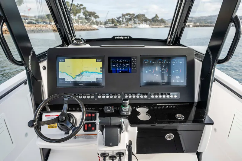Slide: The Image of 2024 Everglades 365 Center Console dashboard with advanced navigation and control systems. - 101