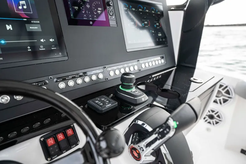 Slide: The Image of 2024 Everglades 365 Center Console dashboard with advanced navigation and control systems. - 121