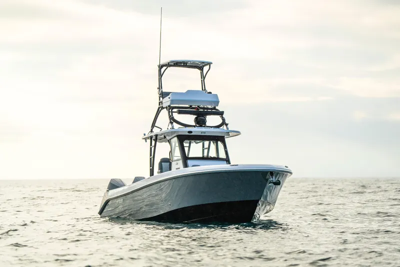 Slide: The Image of 2024 Everglades 365 Center Console boat on open water, showcasing sleek design and advanced features. - 25