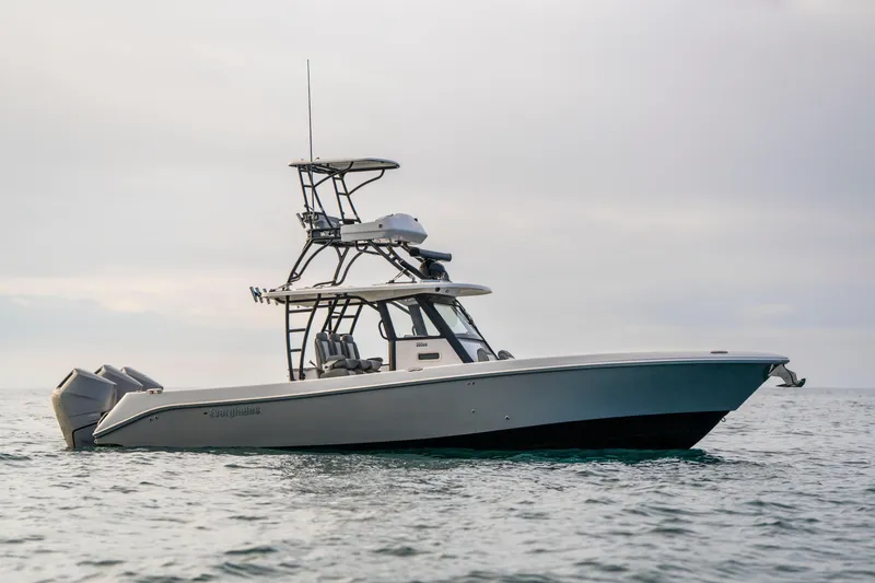Slide: The Image of 2024 Everglades 365 Center Console boat on calm ocean waters. - 29