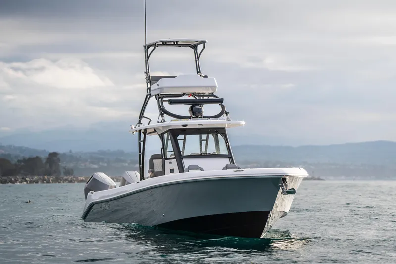 Slide: The Image of 2024 Everglades 365 Center Console boat on water, showcasing sleek design and advanced features. - 42
