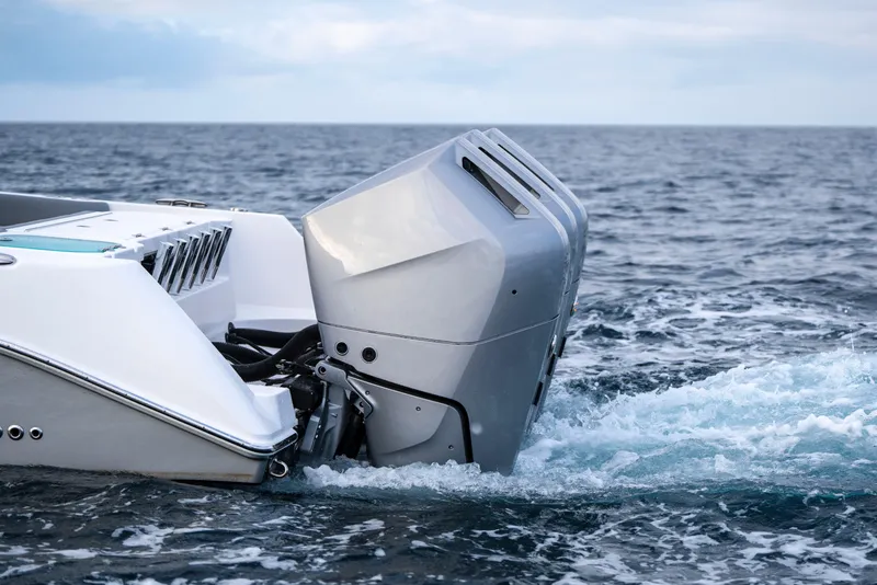 Slide: The Image of 2024 Everglades 365 Center Console boat engine in ocean waters. - 63