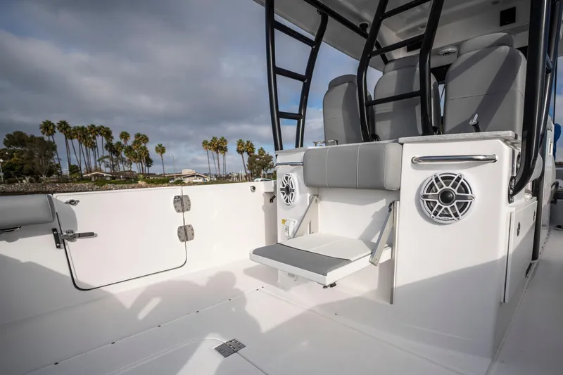Slide: The Image of 2024 Everglades 365 Center Console boat interior with seating and speakers. - 95