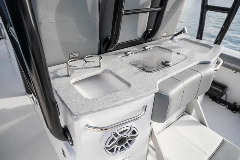 Slide: The Image of 2024 Everglades 365 Center Console boat interior with sleek seating and modern amenities. - 99