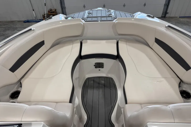 Slide: The Image of 2016 Chaparral 244 Xtreme boat interior with spacious seating and sleek design. - 11