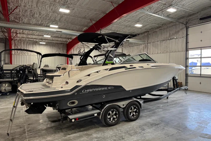 Slide: The Image of 2016 Chaparral 244 Xtreme boat on trailer in indoor storage facility. - 3