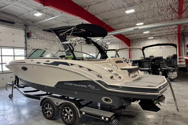 Slide: The Image of 2016 Chaparral 244 Xtreme boat on trailer in indoor showroom. - 4