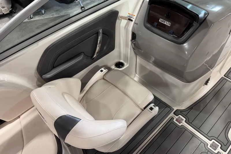 Slide: The Image of 2016 Chaparral 244 Xtreme boat interior with white seating and sleek design. - 7