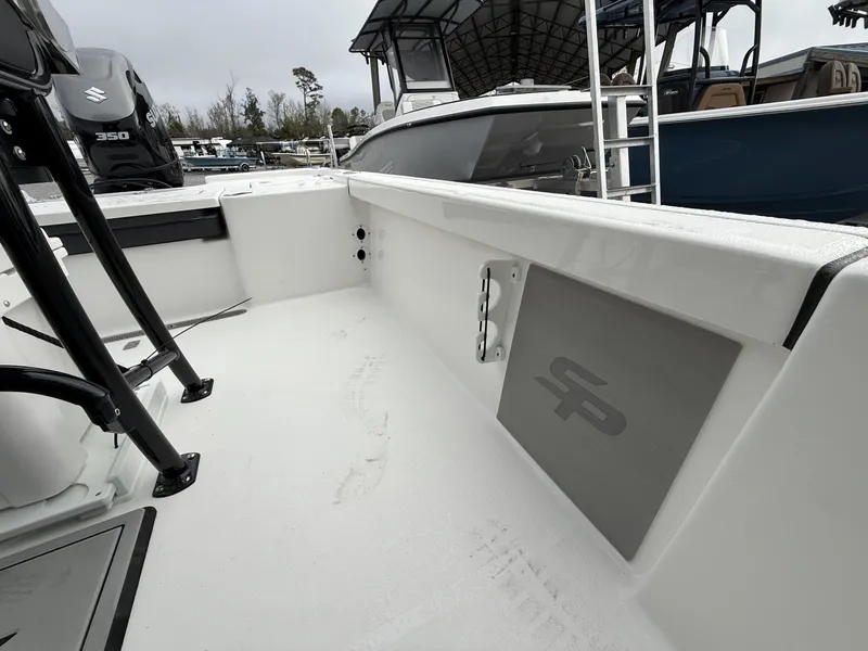 Slide: The Image of 2026 Sea Pro 250 Bay boat with 350HP engine, interior view. - 8
