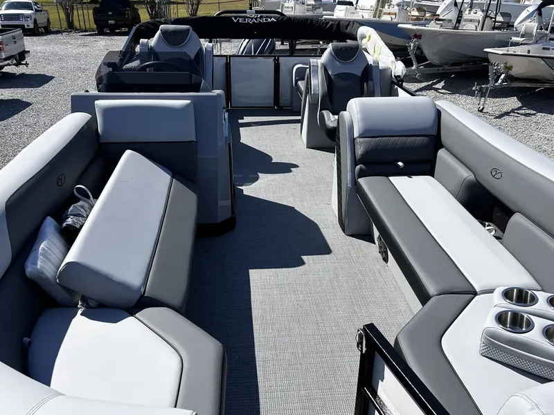 Slide: The Image of Interior of Veranda Vista Series TRITOON-150HP 2026 with gray seating. - 5