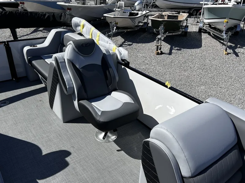 Slide: The Image of Interior of 2026 Veranda Vista Series TRITOON-150HP with gray seating. - 9