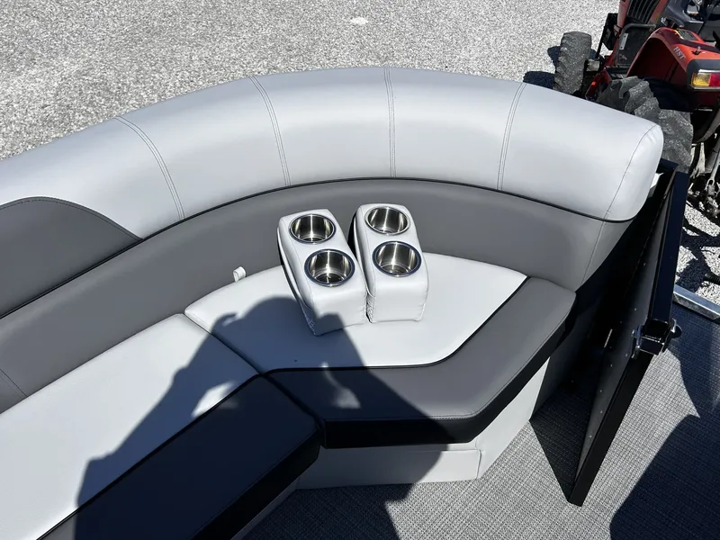 Slide: The Image of Veranda Vista Series TRITOON-150HP seating area with cup holders, 2026 model. - 13