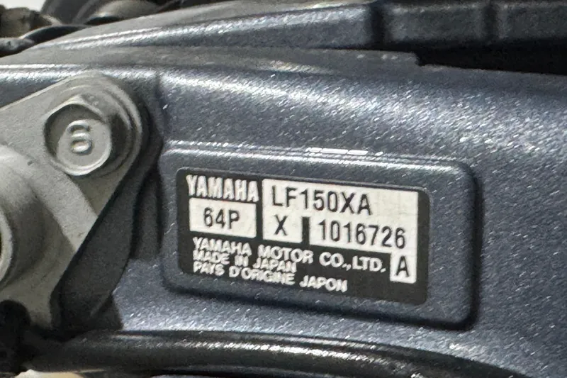 Slide: The Image of Yamaha LF150XA engine label on 2003 Glacier Bay 2640SX Renegade boat. - 47