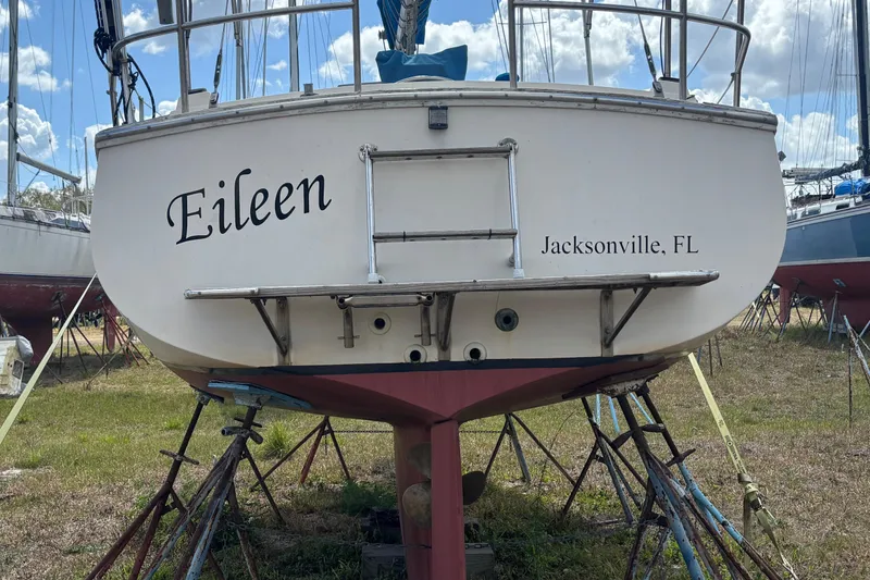 Slide: The Image of 1987 Island Packet 27 sailboat named "Eileen" from Jacksonville, FL, on dry dock. - 2