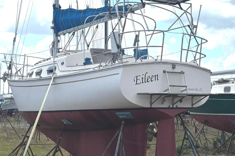 Slide: The Image of 1987 Island Packet 27 sailboat named "Eileen" on stands, Jacksonville, FL. - 5