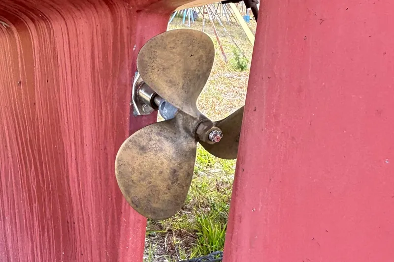 Slide: The Image of Propeller of 1987 Island Packet 27 sailboat, close-up view. - 6