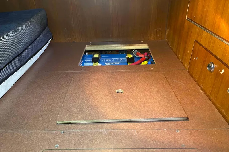 Slide: The Image of Hidden battery compartment in 2006 Hunter 36 sailboat interior. - 18