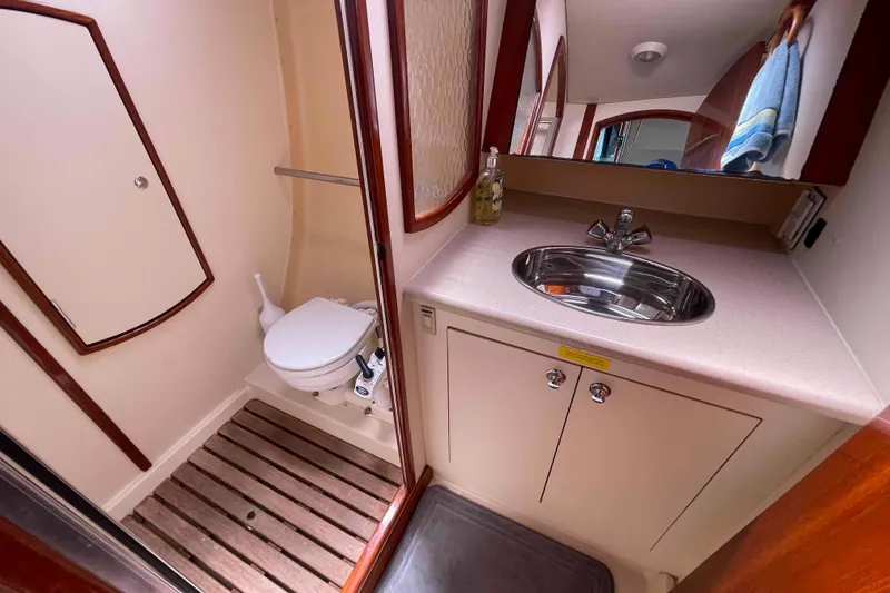 Slide: The Image of Bathroom interior of 2006 Hunter 36 yacht with sink and toilet. - 19
