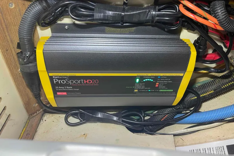Slide: The Image of ProSport HD20 marine battery charger in a 2006 Hunter 36 boat, installed with wiring. - 22