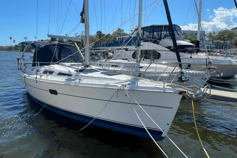 Slide: The Image of Sailboat docked in marina, 2006 Hunter 36 model, sunny day, calm waters. - 52