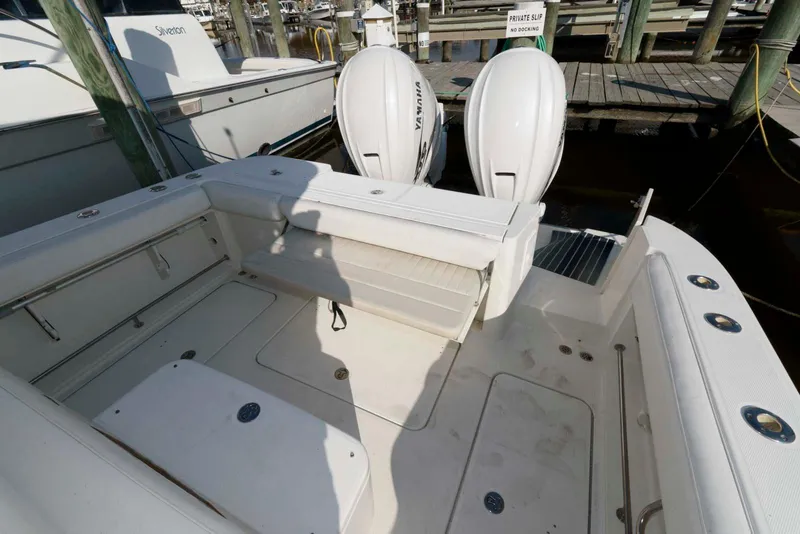 Slide: The Image of 2008 Hydra-Sports Vector 3500 VX boat with twin outboard engines at dock. - 12