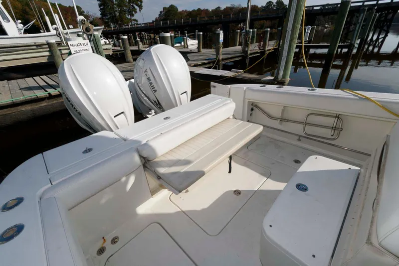Slide: The Image of 2008 Hydra-Sports Vector 3500 VX boat with twin outboard engines at dock. - 14