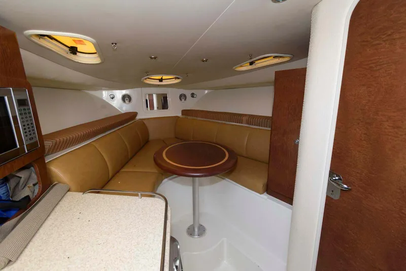 Slide: The Image of 2008 Hydra-Sports Vector 3500 VX cabin interior with seating and table. - 16