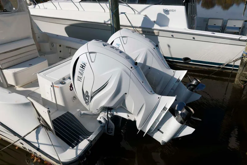 Slide: The Image of 2008 Hydra-Sports Vector 3500 VX with twin Yamaha outboard engines docked. - 3