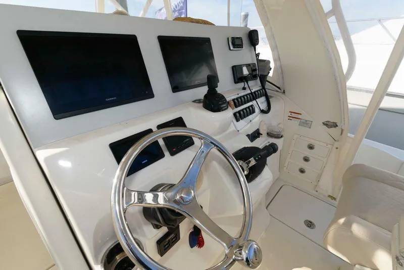 Slide: The Image of 2008 Hydra-Sports Vector 3500 VX helm with modern navigation equipment and controls. - 7