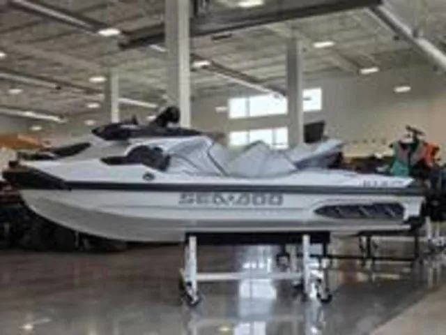 Slide: The Image of 2026 Sea-Doo GTX jet ski displayed in showroom. - 18