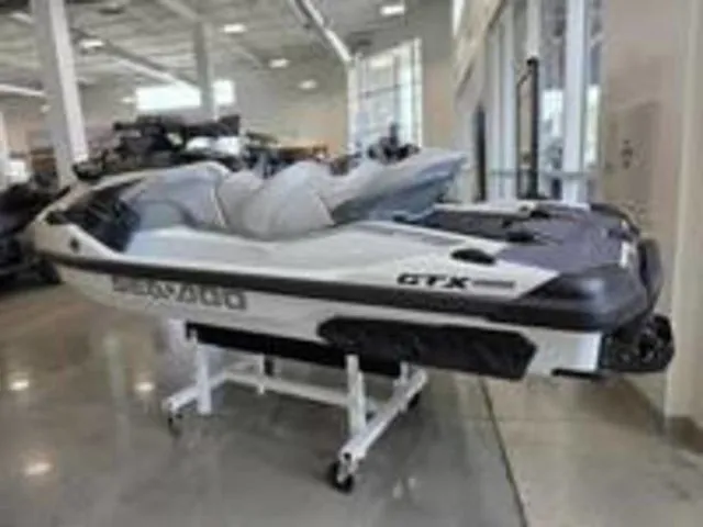 Slide: The Image of 2026 Sea-Doo GTX jet ski displayed in showroom. - 3