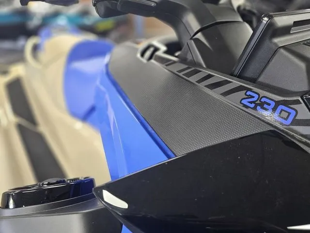 Slide: The Image of Close-up of 2026 Sea-Doo Wake jet ski, blue and black design. - 10