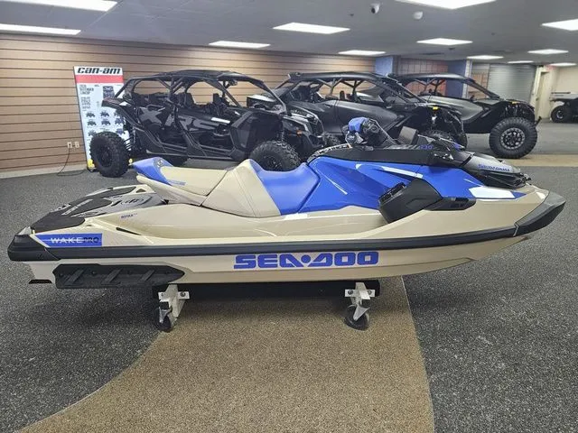 Slide: The Image of 2026 Sea-Doo Wake jet ski displayed in showroom. - 8