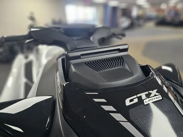 Slide: The Image of Close-up of Sea-Doo GTX 2026 jet ski indoors. - 11