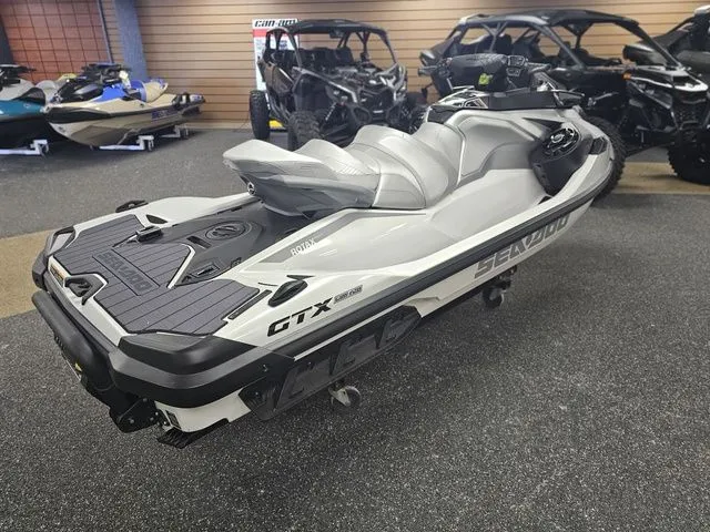 Slide: The Image of 2026 Sea-Doo GTX jet ski in a showroom. - 8