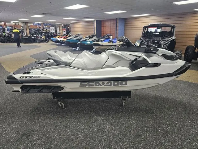 Slide: The Image of 2026 Sea-Doo GTX jet ski displayed in showroom. - 9