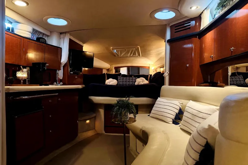 Slide: The Image of Luxurious interior of a 2002 Sea Ray Sundancer 320 yacht with elegant furnishings. - 29