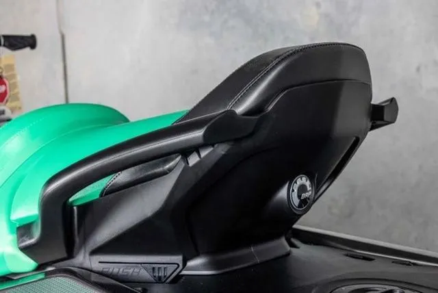 Slide: The Image of 2026 Sea-Doo GTI SE 130 seat detail, green and black design. - 11