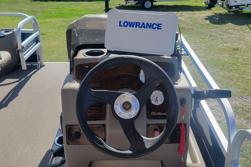 Slide: The Image of 2023 Sun Tracker Bass Buggy 18 DLX steering console with Lowrance display. - 8