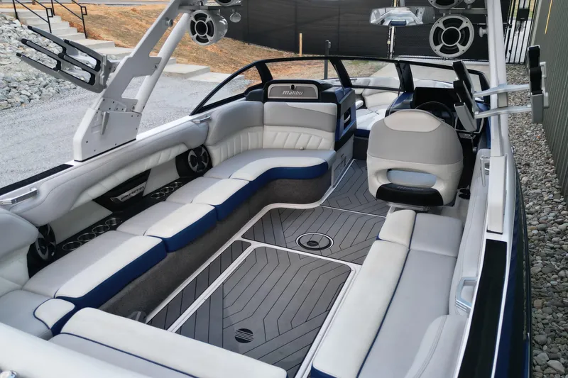 Slide: The Image of 2017 Malibu Wakesetter 25 LSV interior with spacious seating and modern design. - 10