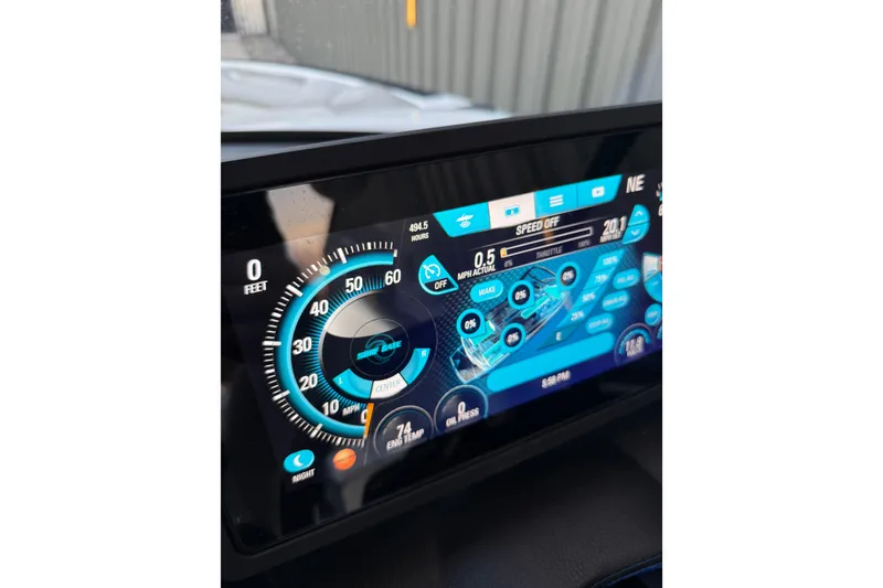 Slide: The Image of Dashboard display of 2017 Malibu Wakesetter 25 LSV boat with speed and engine data. - 17