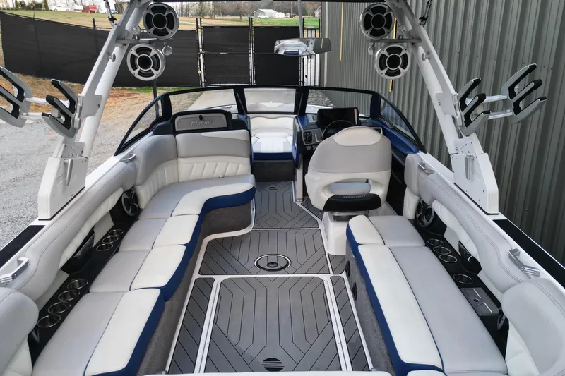 Slide: The Image of 2017 Malibu Wakesetter 25 LSV interior with spacious seating and modern design. - 6