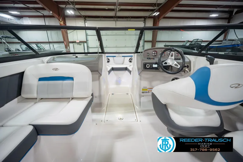 Slide: The Image of 2015 Regal 2000 ESX Bowrider interior with modern dashboard and seating. - 17
