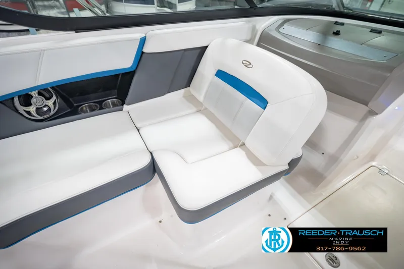 Slide: The Image of Interior of 2015 Regal 2000 ESX Bowrider with white and blue seating. - 26
