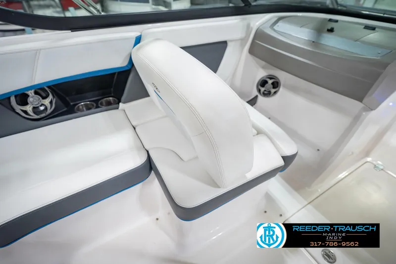Slide: The Image of Interior of 2015 Regal 2000 ESX Bowrider with white seating and speaker system. - 27