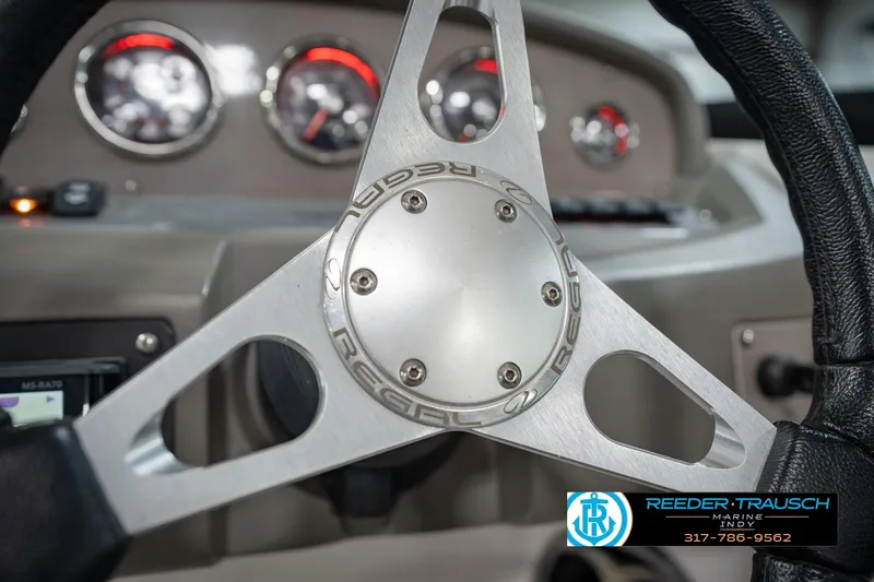 Slide: The Image of Steering wheel of 2015 Regal 2000 ESX Bowrider with dashboard gauges. - 30
