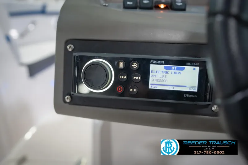Slide: The Image of Close-up of a Fusion MS-RA70 stereo on a 2015 Regal 2000 ESX Bowrider boat. - 31