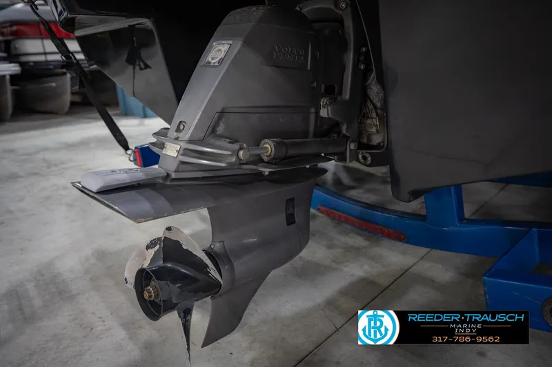 Slide: The Image of 2015 Regal 2000 ESX Bowrider boat propeller and stern drive in a workshop. - 46