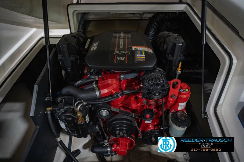 Slide: The Image of Engine compartment of a 2015 Regal 2000 ESX Bowrider boat, featuring a V6 engine. - 48