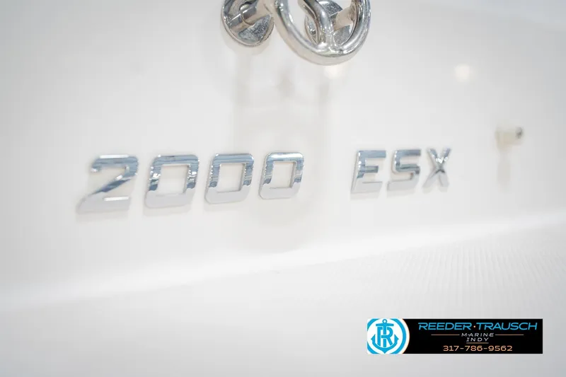 Slide: The Image of 2015 Regal 2000 ESX Bowrider boat emblem with Reeder Trausch Marine logo. - 51